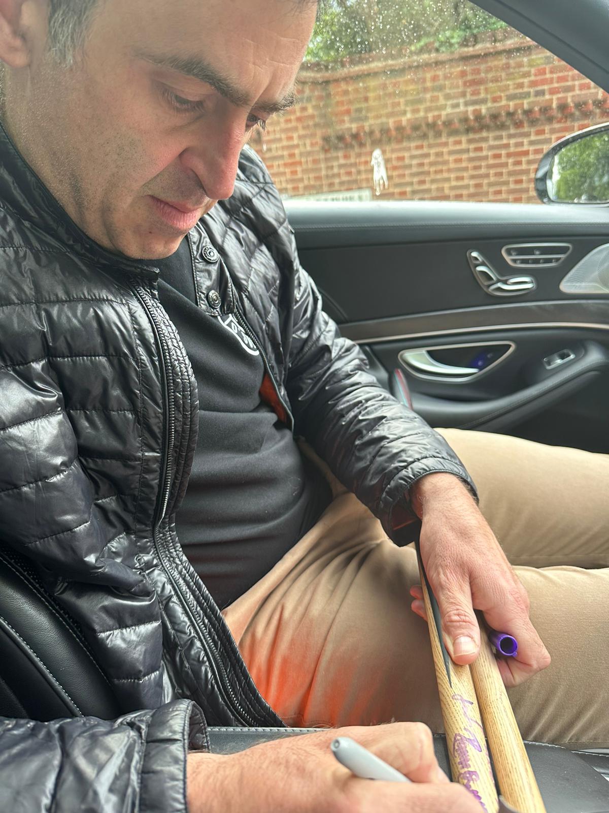 Snooker Cue, signed by Rocket Ronnie O'Sullivan.