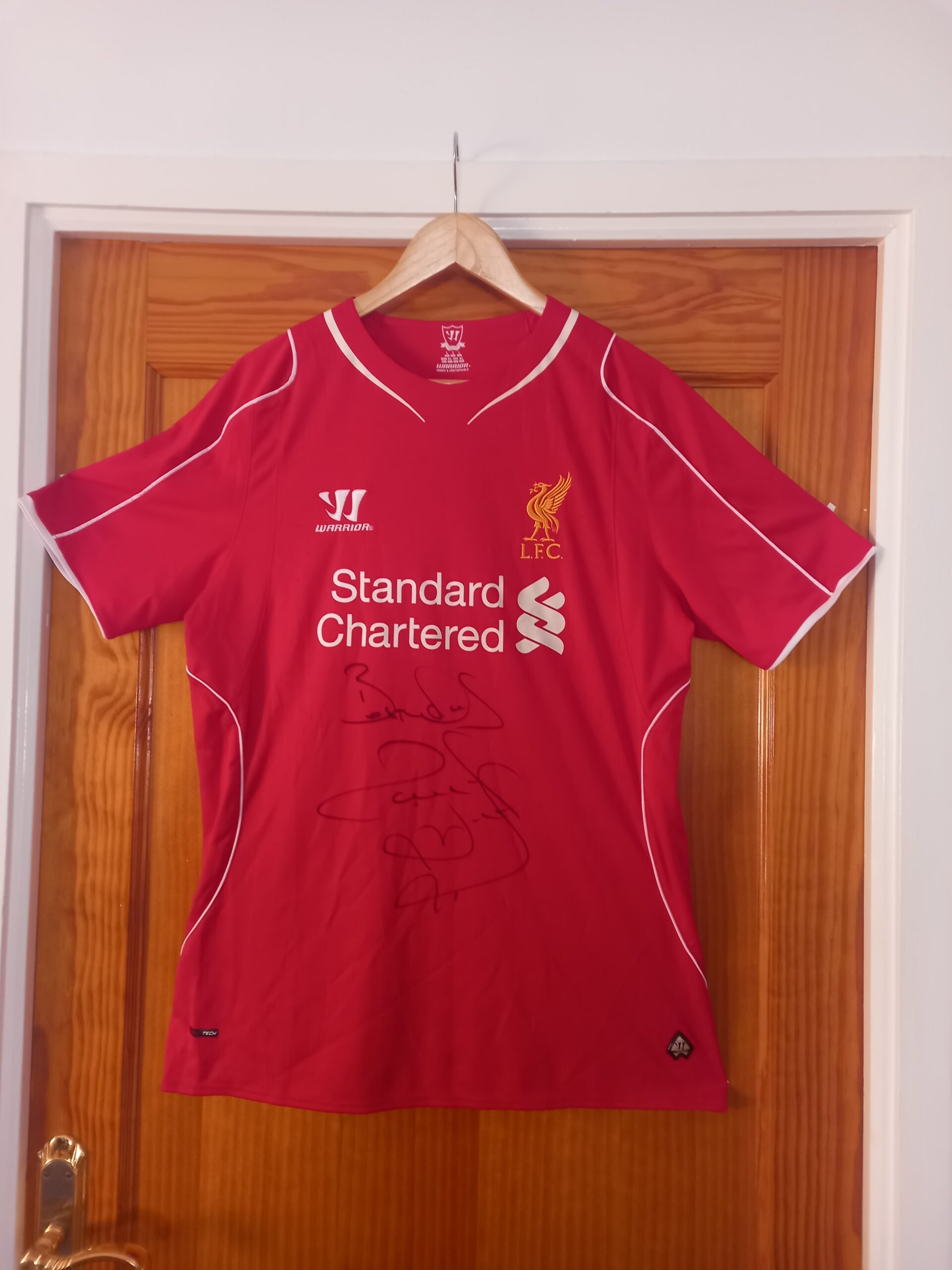 Liverpool shirt, signed by football legend Paul Ince